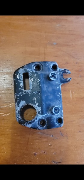 Honda ATC 70 ignition panel before restoration — severely worn with flaking paint, exposed metal, and faded finish