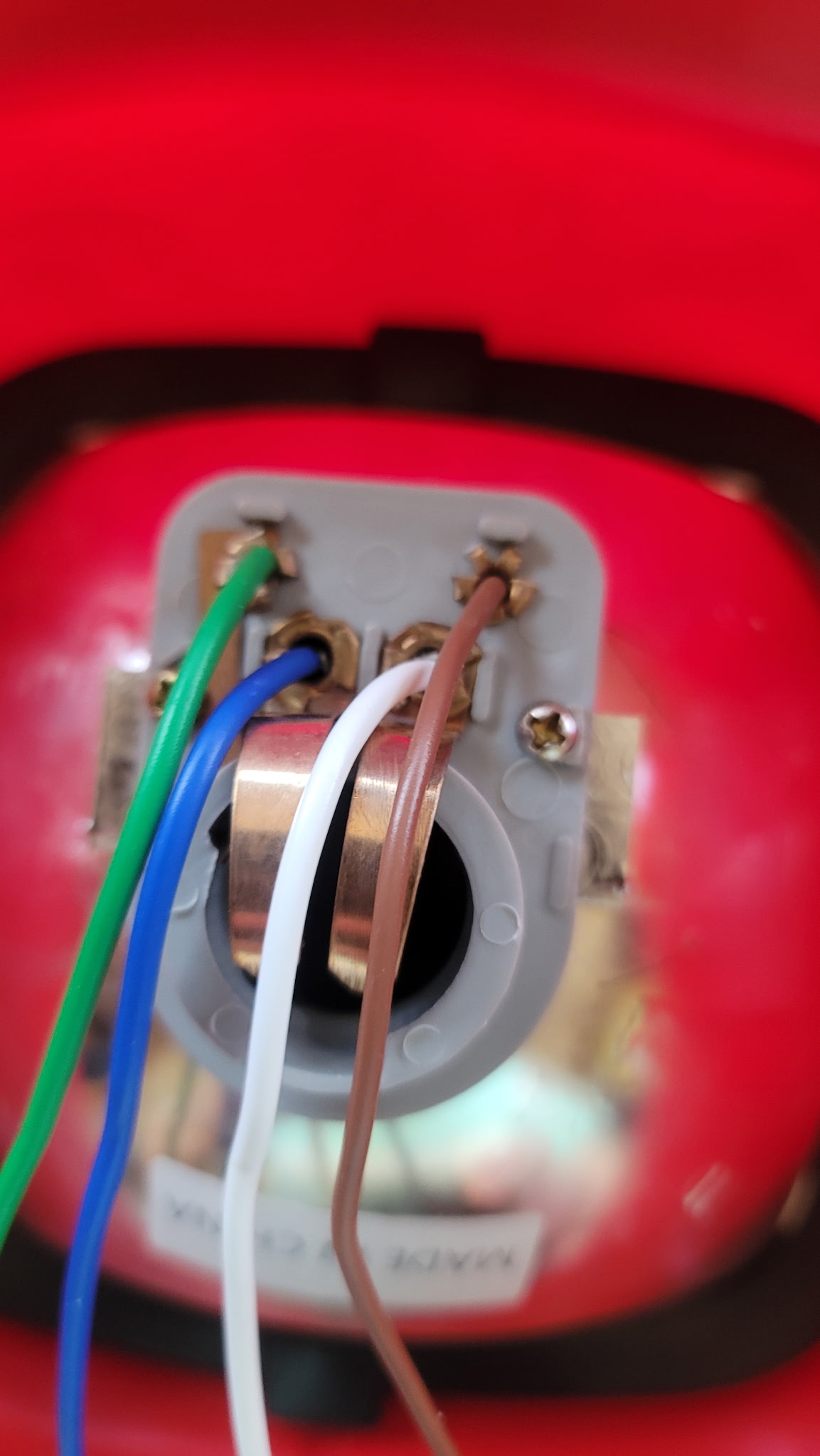 Acerbis headlight switch and wiring connector showing green, blue, white, and brown wires on Scott's ATC 125 front end swap