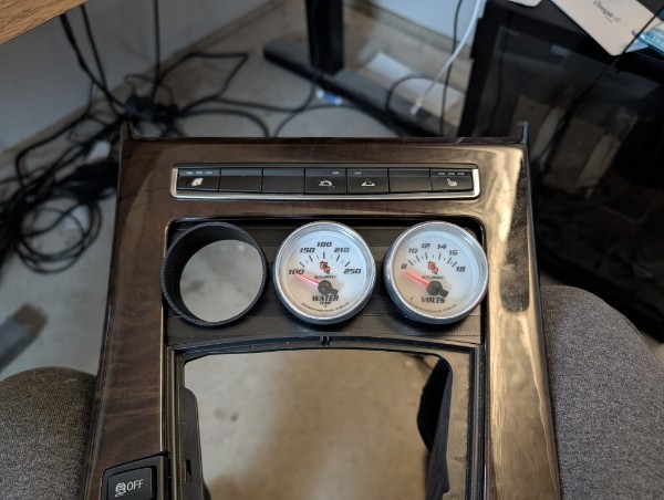 Autometer water temp and volt gauges installed in Steve's BMW Z4 center console gauge pod