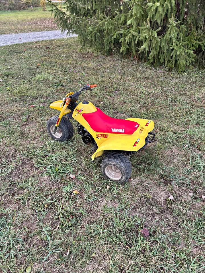1986 Yamaha Tri Zinger 60 three-wheeler, fully restored with clean plastics and period-correct finish — a rare find on the used market in 2026